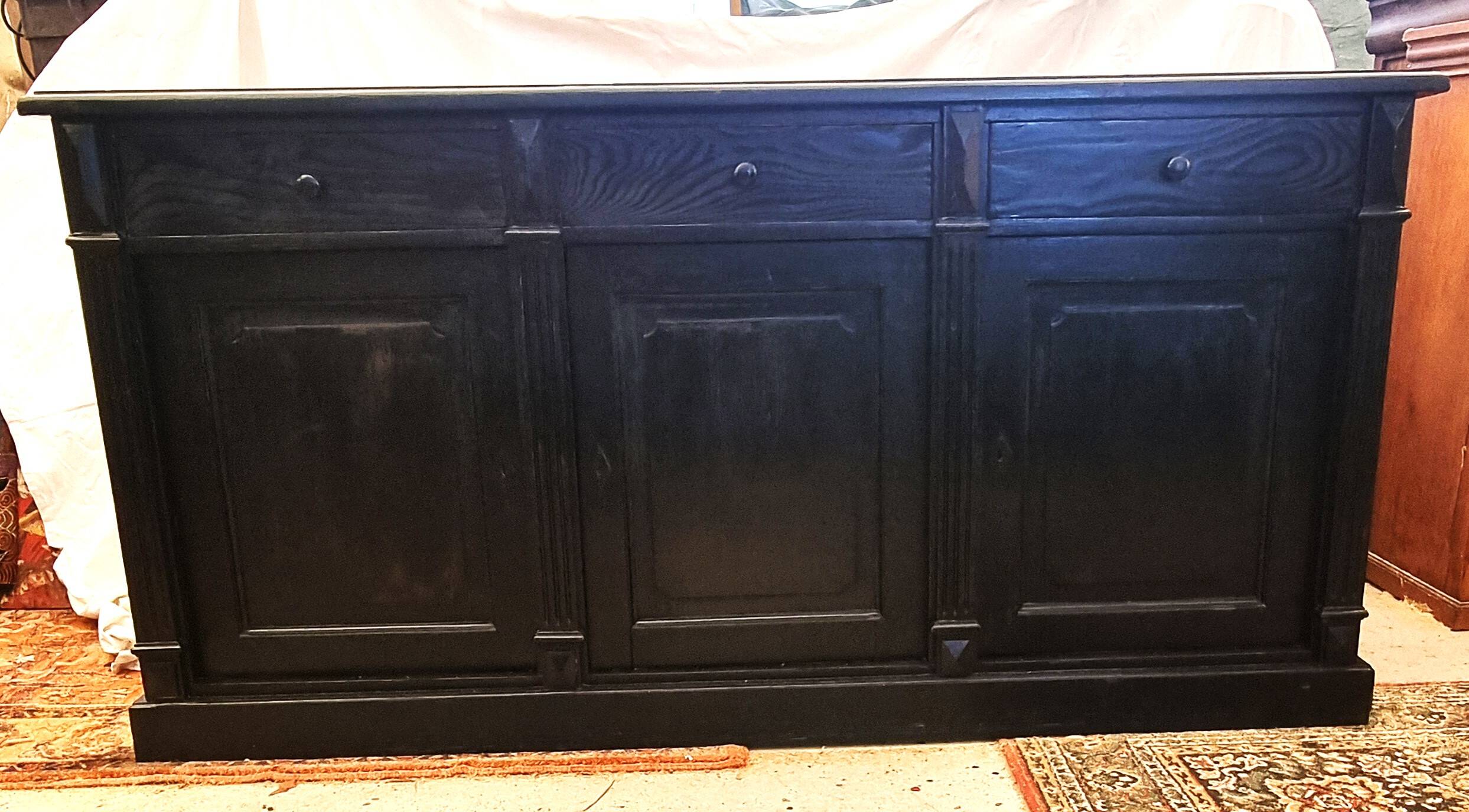 Black patinated chest of drawers
