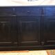 Black patinated chest of drawers