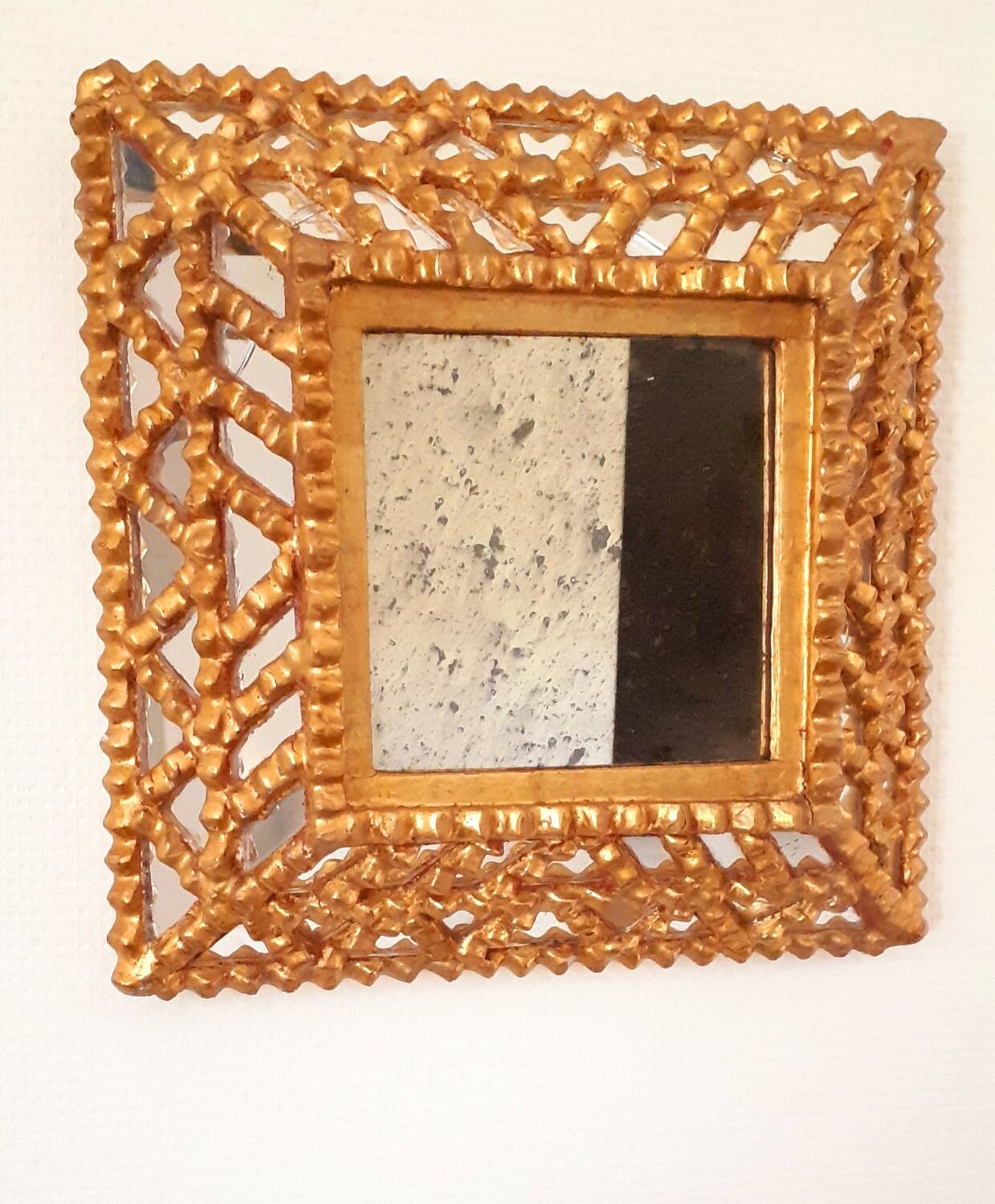 Vintage gilded mirror with glazing beads