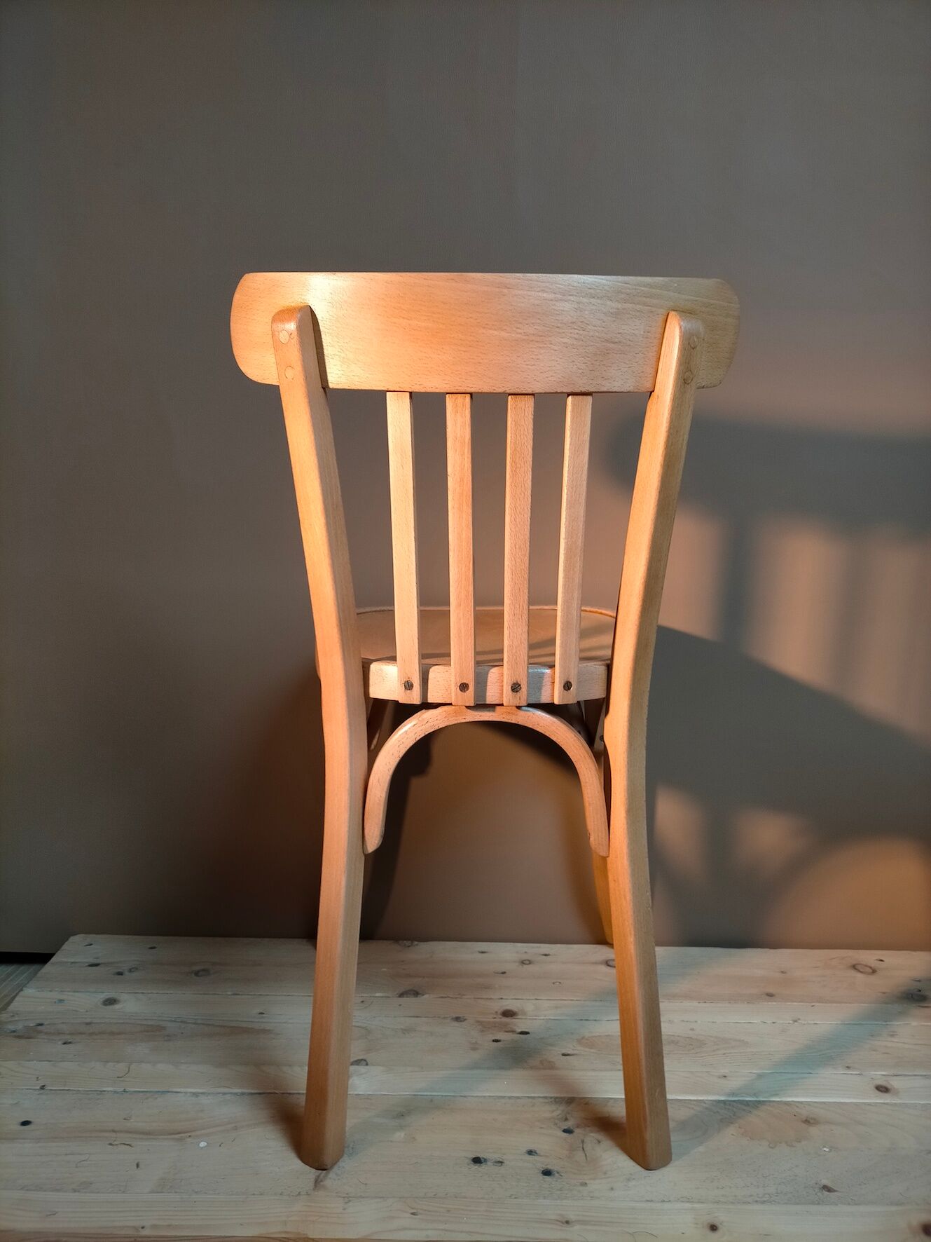 Set of two vintage bistro chairs in curved wood - baumann