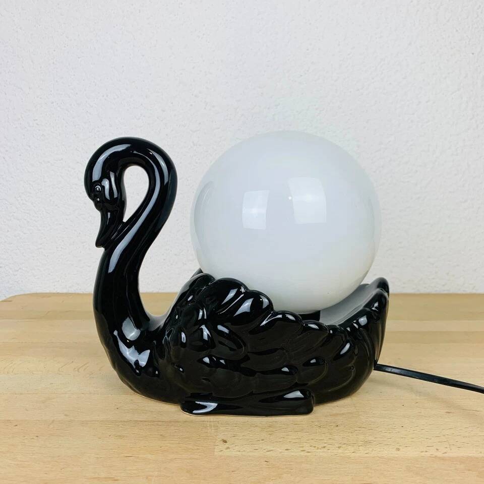 Black ceramic swan lamp with vintage opaline globe