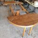 Oval oak table with carved details - known as a hunting table.