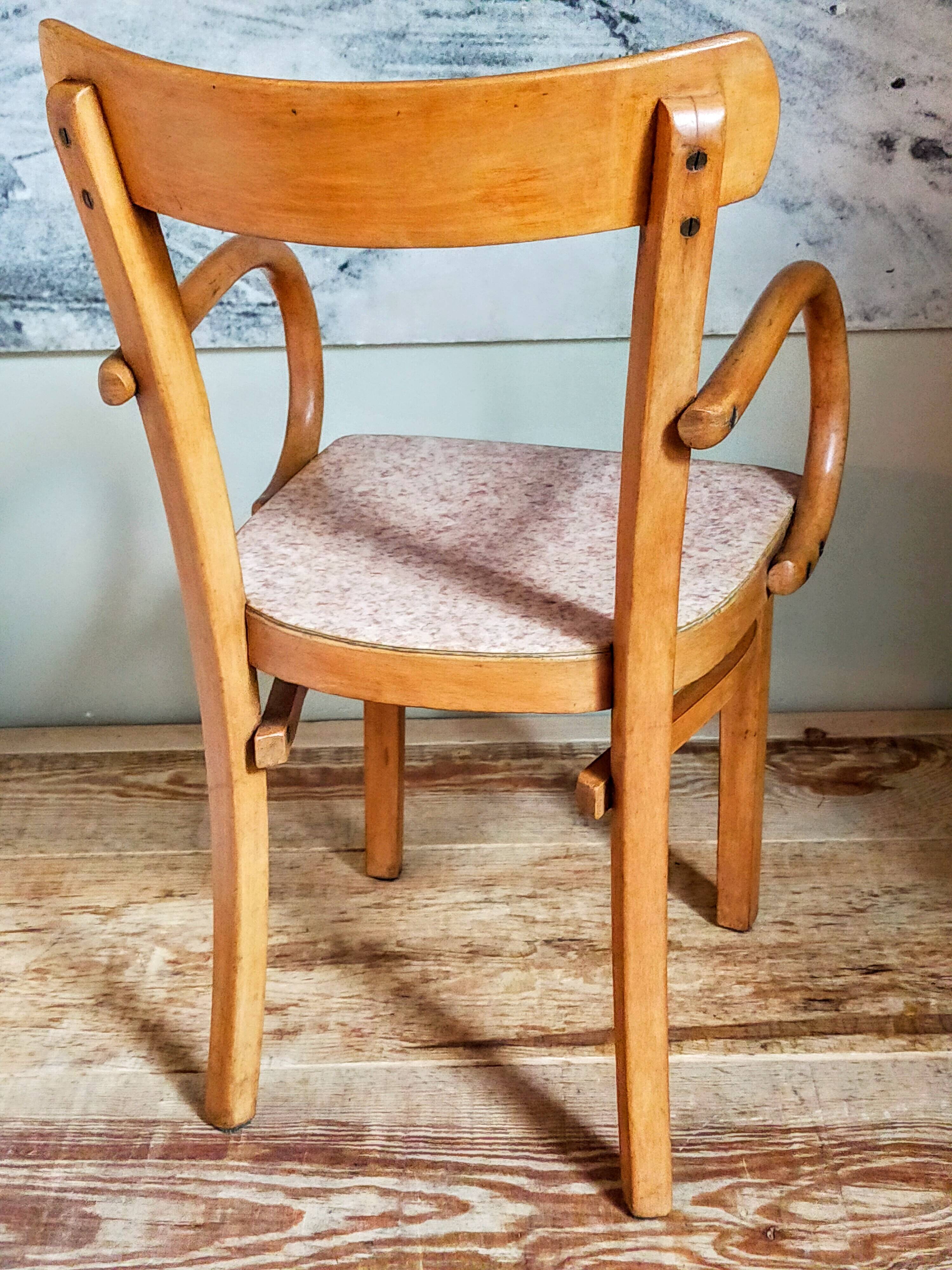 Children's armchair in old bent wood