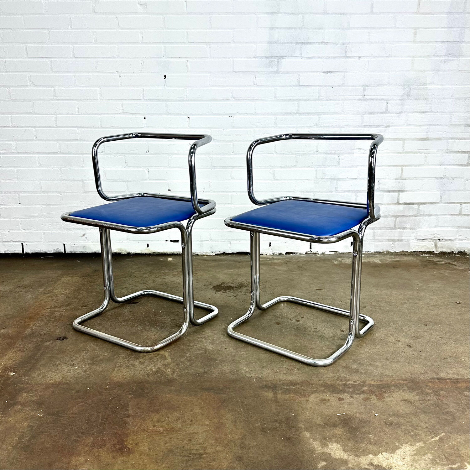 Vintage tubular frame dining room chairs