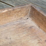 Old wooden cutting board with edges