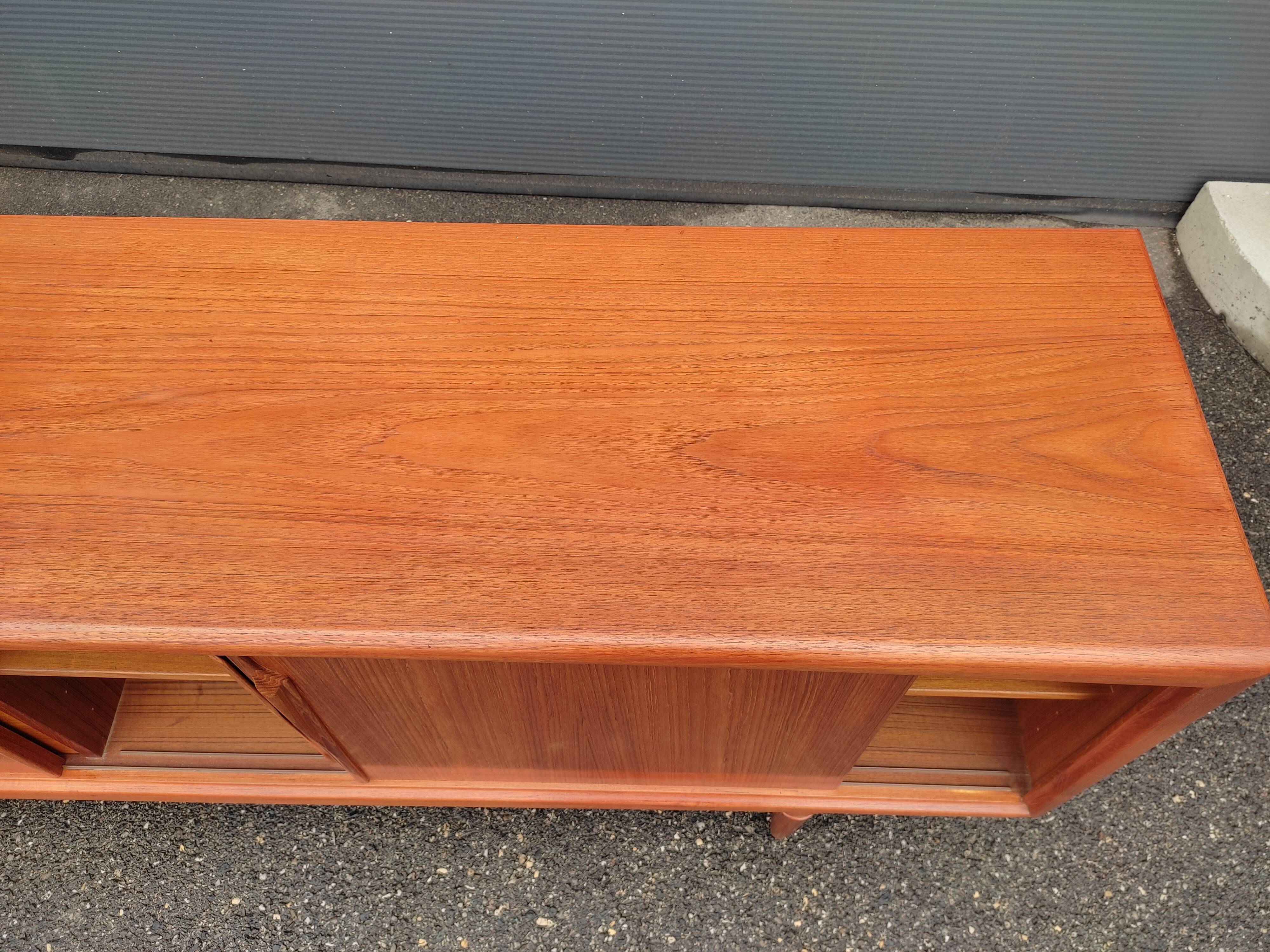 Scandinavian teak row by Axel Christensen for ACO Mobler