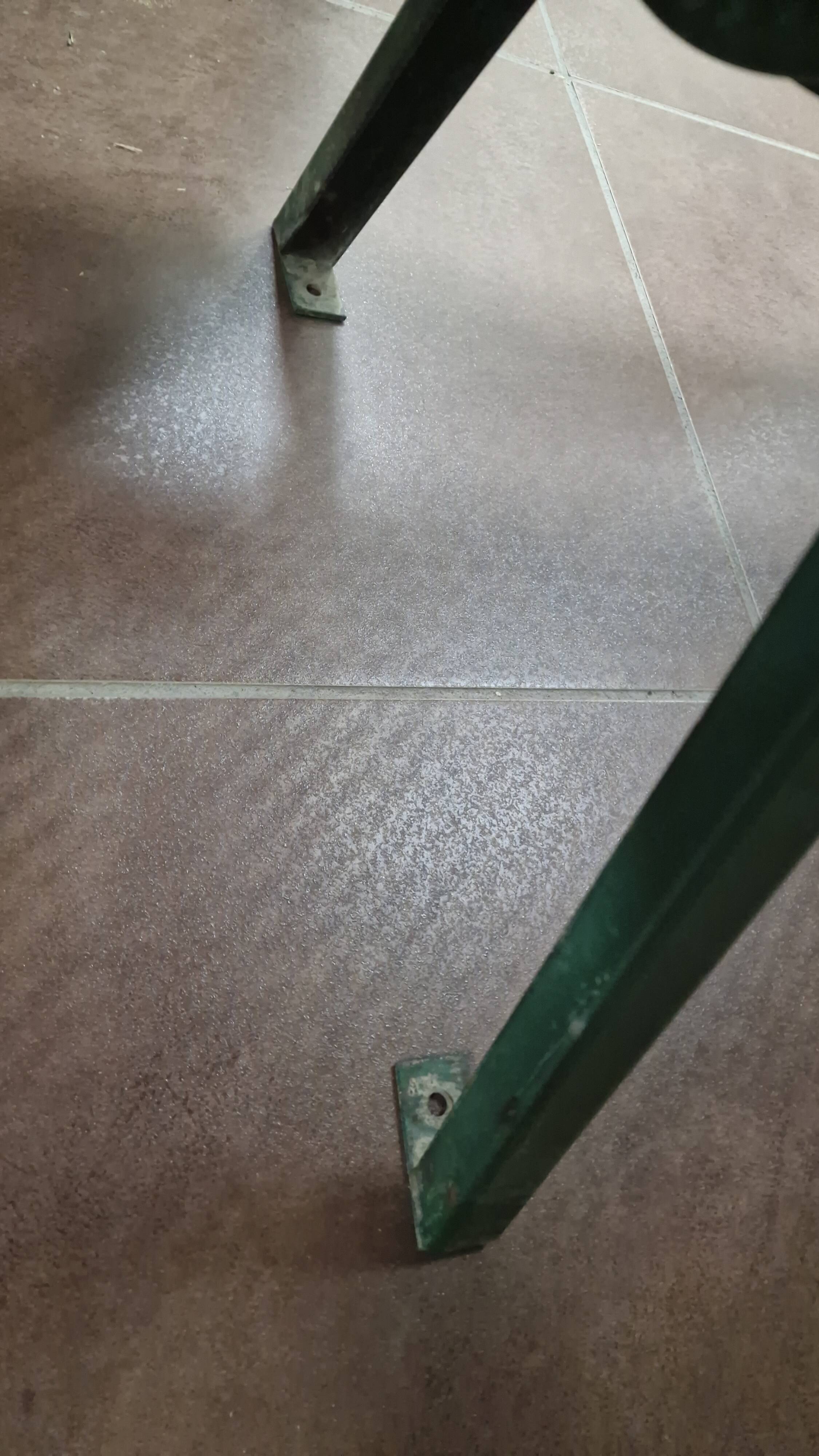 Vintage green perforated metal public bench