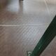 Vintage green perforated metal public bench