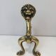 Pair of bronze andirons with lions
