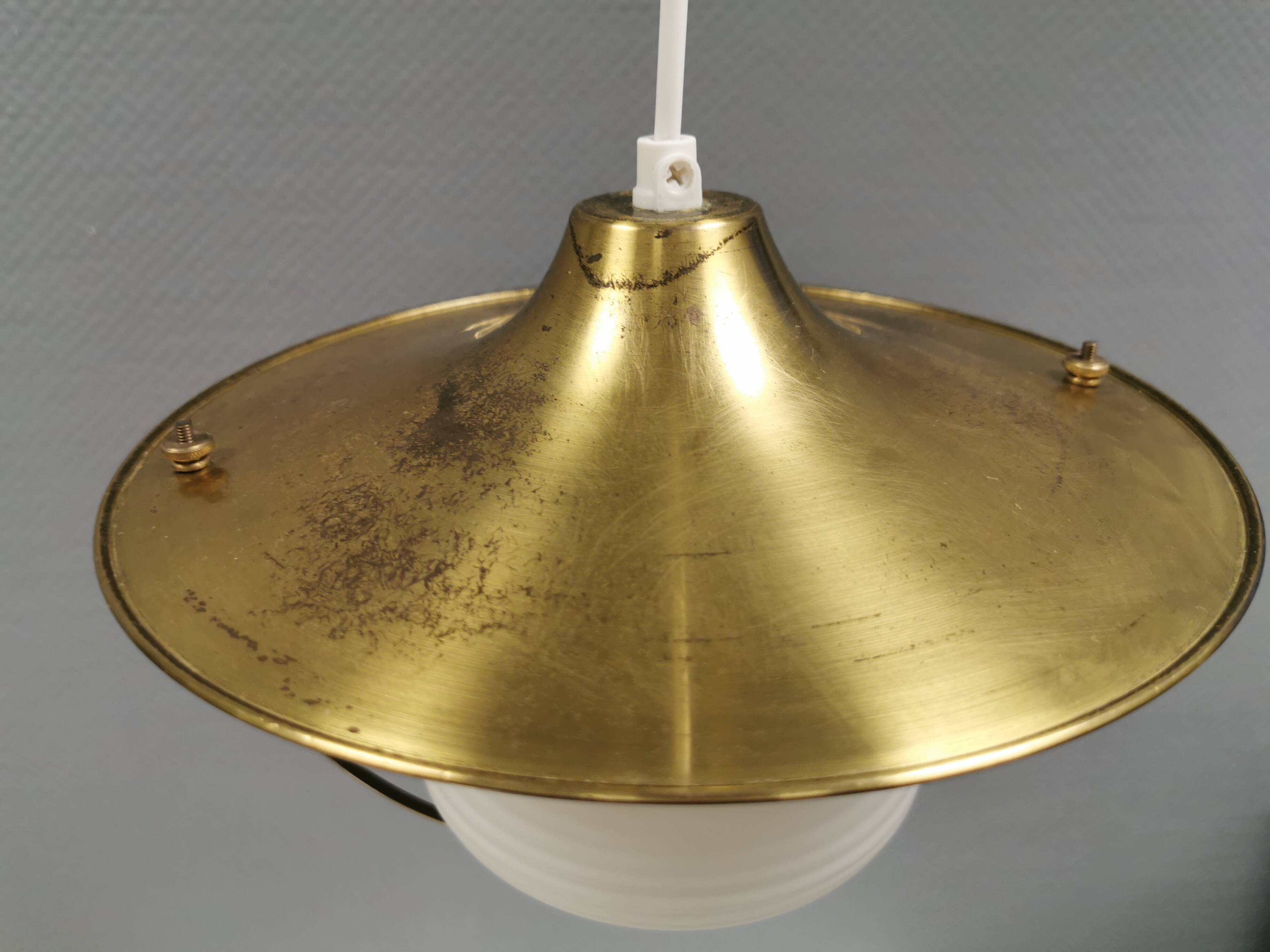 Beautiful older hanging lamp in brass and milky white glass. Germany 1950s