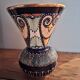 Quimper vase in earthenware - relief enamelled beaded pattern