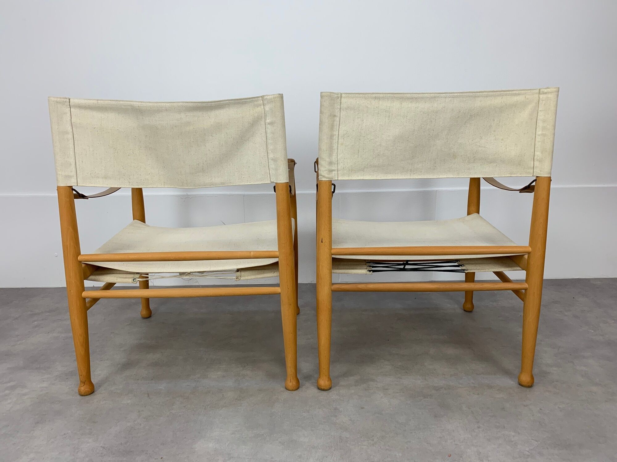Pair of safari armchairs canvas and leather stretched