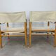 Pair of safari armchairs canvas and leather stretched