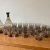 Service of glasses, cups, decanters of the 50s in smoked glass
