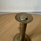 Old brass pull candle holder