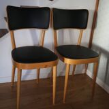 5 baumann chairs with large backs in black faux leather.