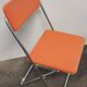 FRAMAR orange folding chair