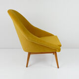 Fauteuil coque jaune vintage