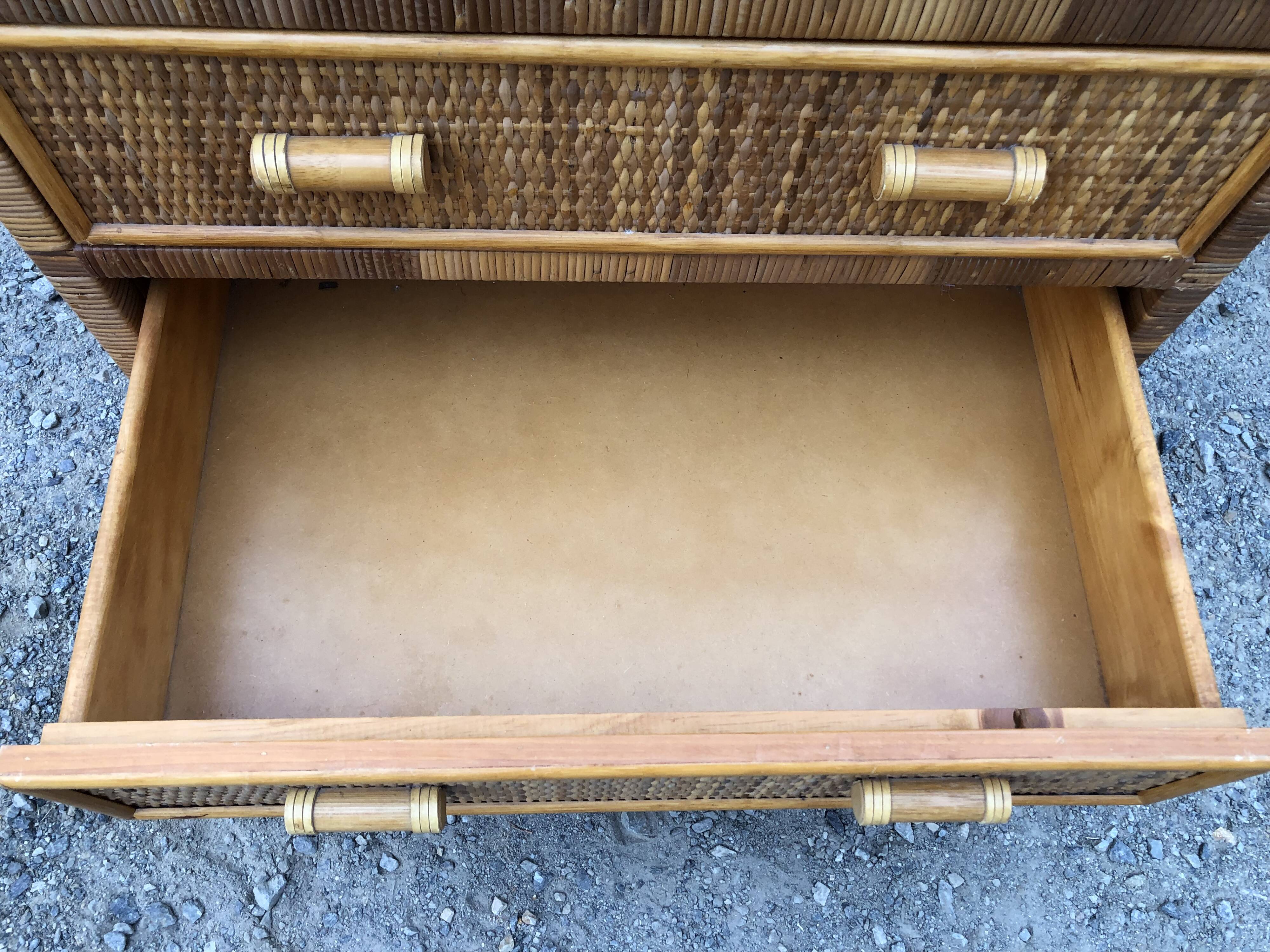 Vintage rattan chest of drawers has 3 drawers.