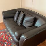 Leather sofa with flower wool