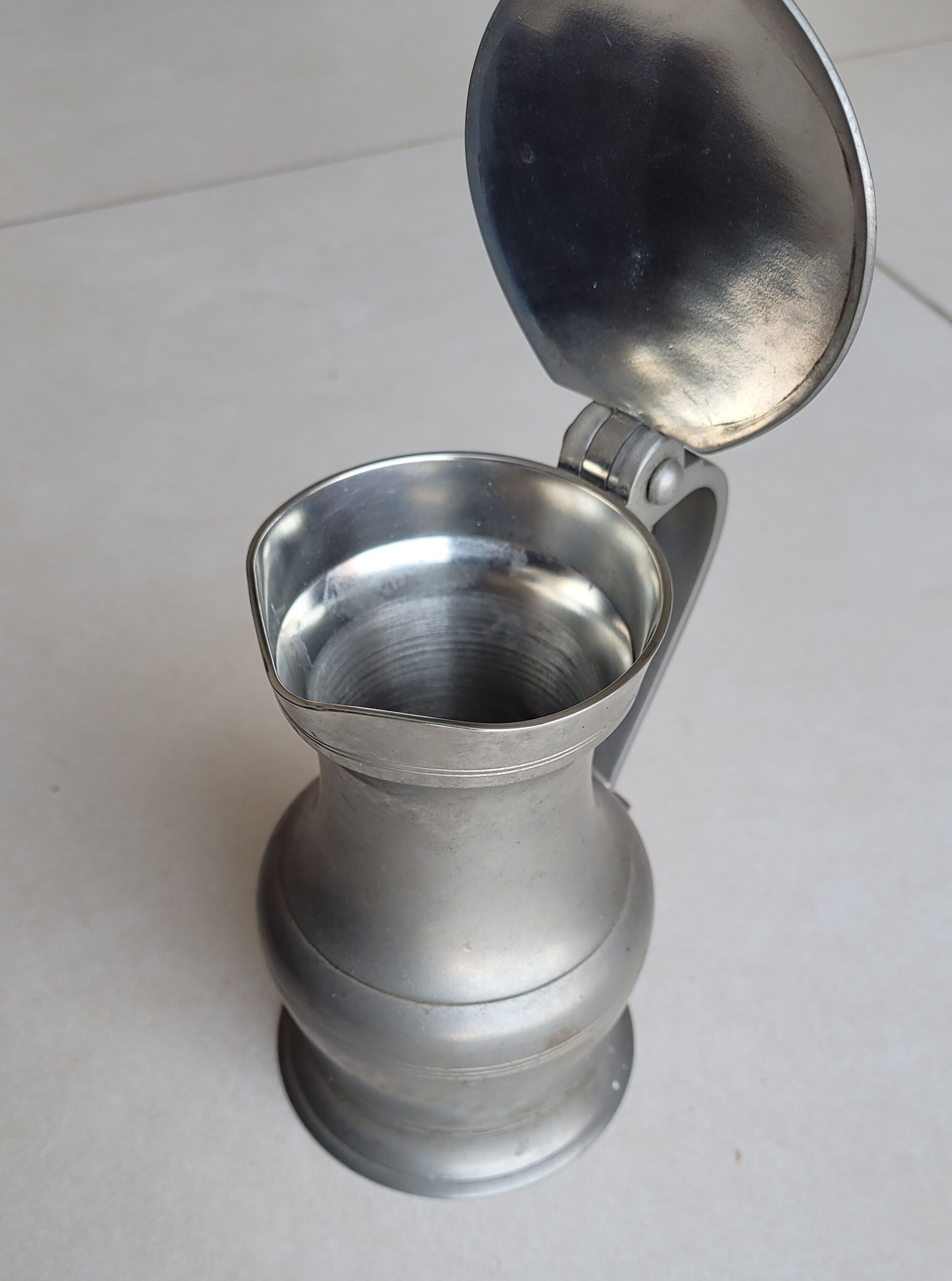 Pewter cutlery pitcher