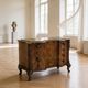 serpentine commode in antique walnut