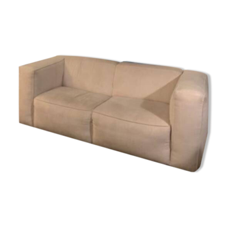 Beige corduroy two-seater sofa