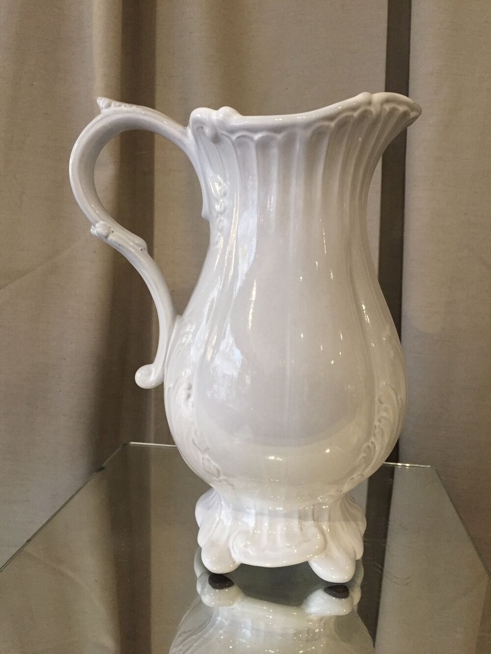 Pitcher has beautiful model beyerle niderviller black earth enamelled with white