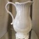 Pitcher has beautiful model beyerle niderviller black earth enamelled with white