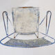 Vintage perforated metal armchair from the 1950s.