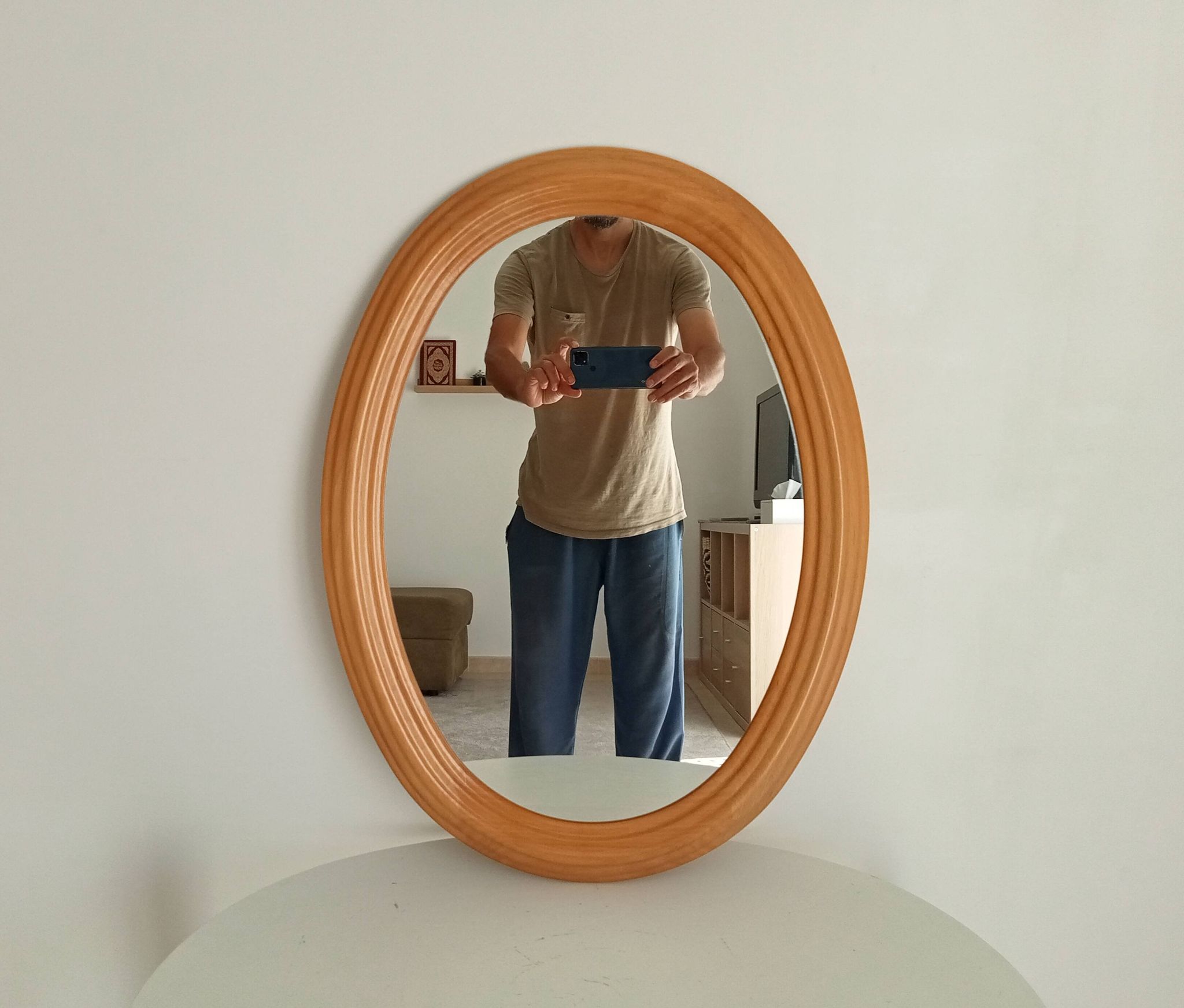 Vintage oval mirror in beech from the 70s/80s.