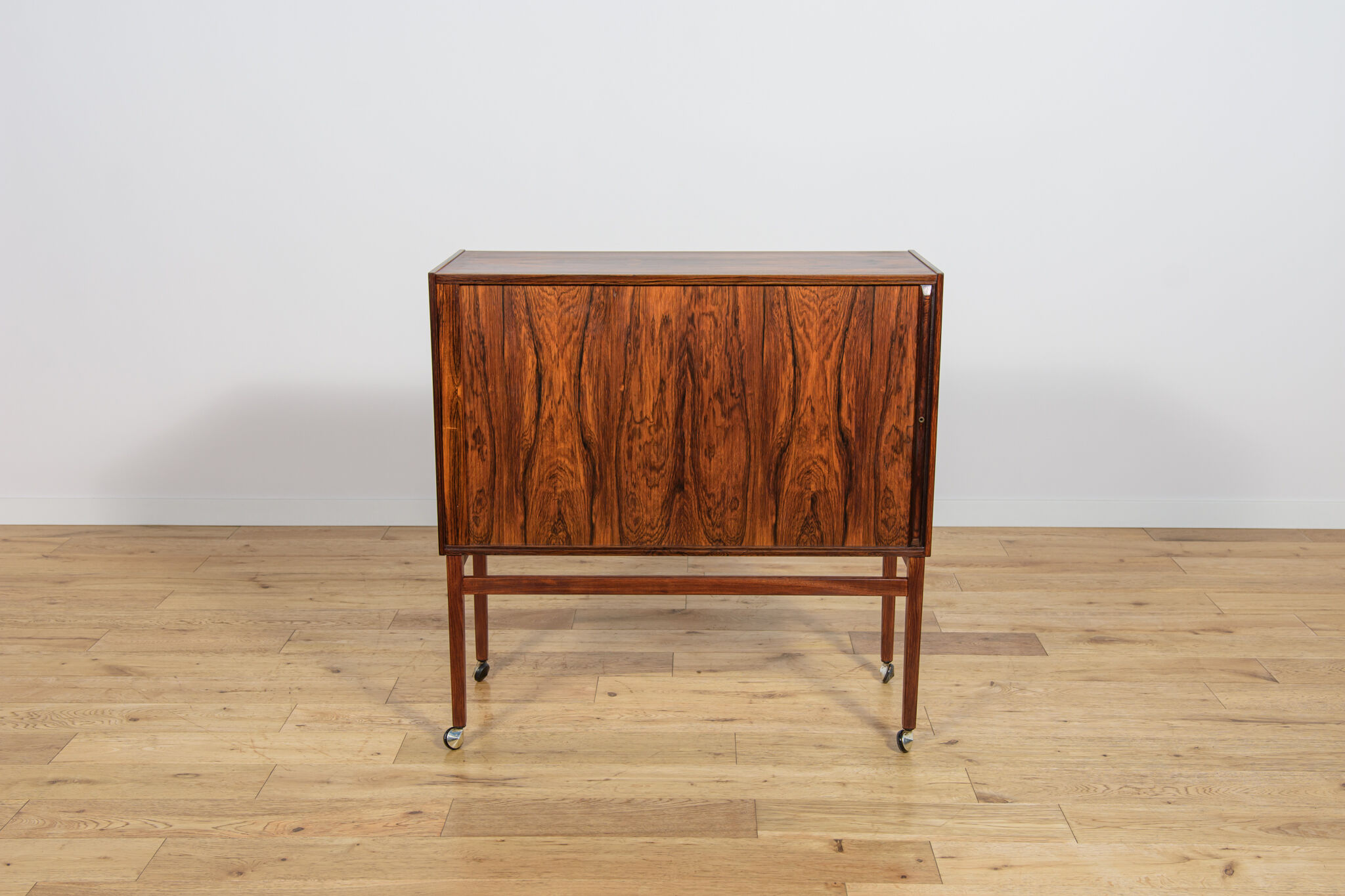 Mid-century rosewood bar with roller doors, Denmark, 1960s