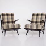 Paire de fauteuils laqués noirs 1950s