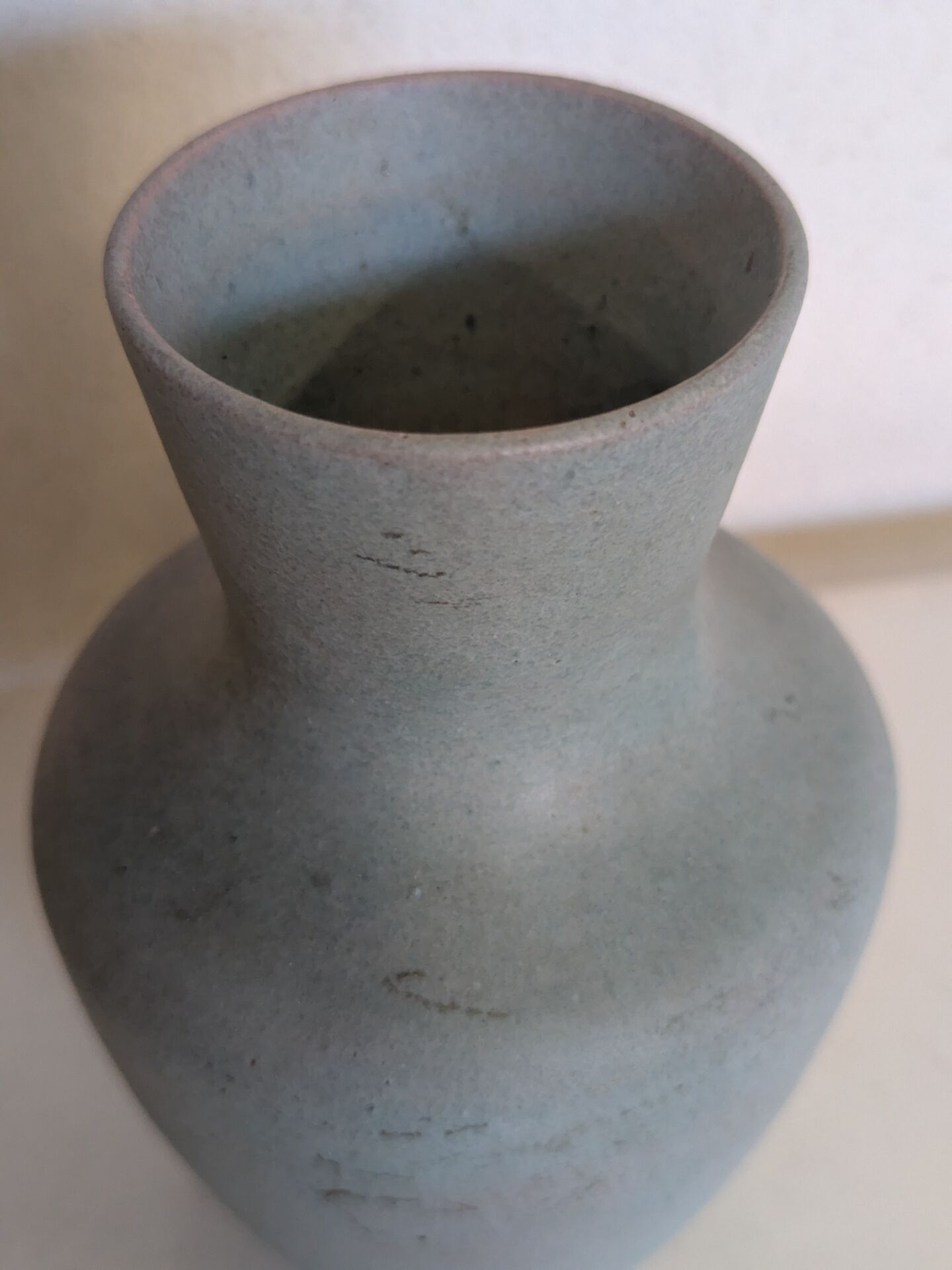 Small blue-grey glazed stoneware vase signed CB, studio work, year