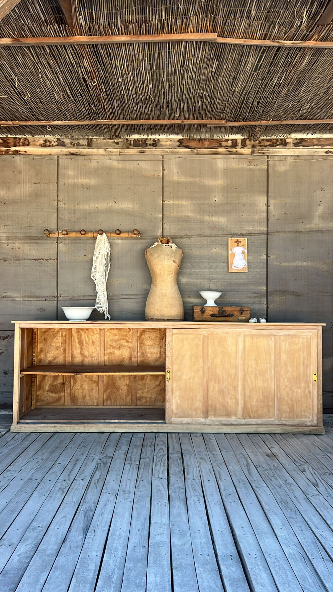 Old counter with sliding doors in raw wood