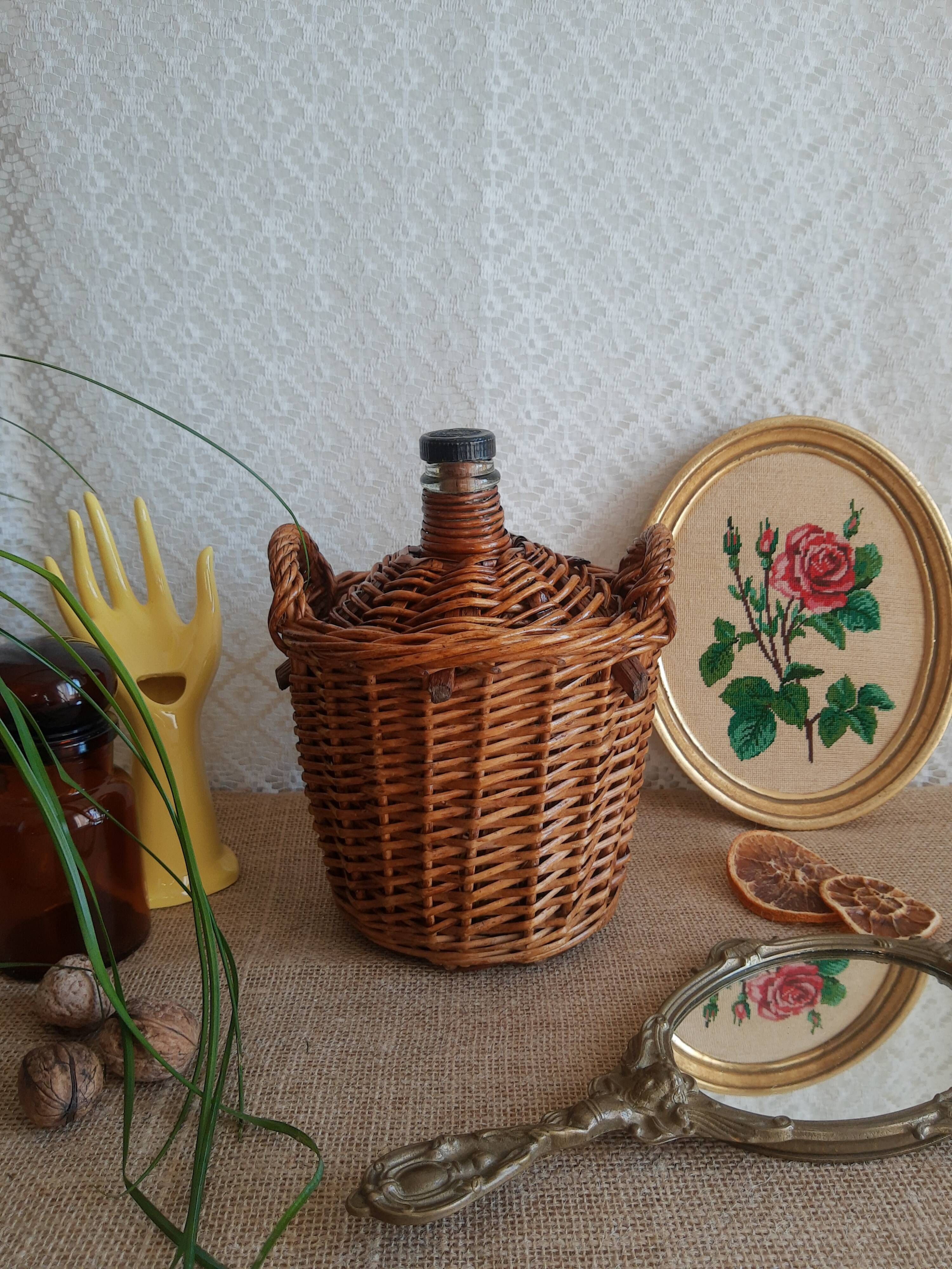 Small canister demijohn in glass circled with wicker - vintage