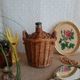Small canister demijohn in glass circled with wicker - vintage