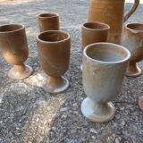 Service mazagrans and decanter in enamelled stoneware.