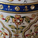 Hindu marble vase with floral decoration and gold leaf, in a box. Height 20 cm.