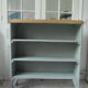 Vintage bookcase green of gray wooden top