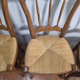 4 rustic farmhouse chairs made of wood and straw
