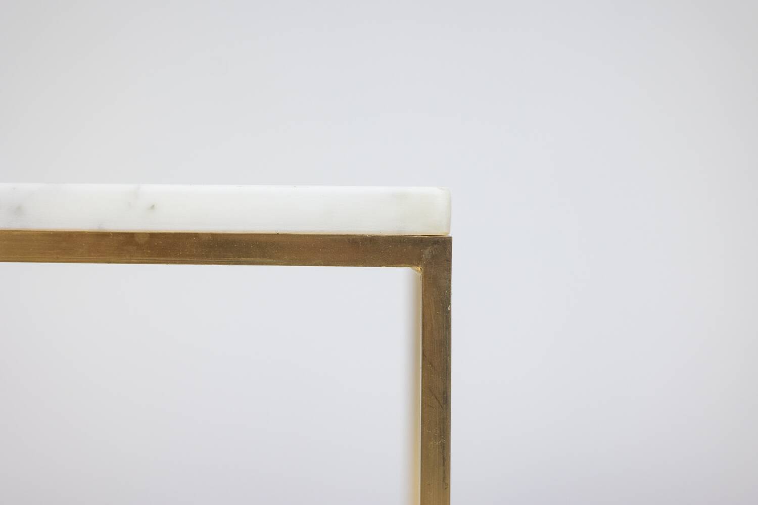 Pair of marble and gilt bronze end tables. 1970s.