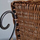 Small antique piece of furniture from the 1960s made of rattan and wrought iron in the shape of a lyre.