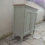 Small vintage piece of furniture with a shallow depth, re-enchanted in grey-green.