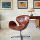 First edition Arne Jacobsen Swan chair, original patinated leather, 1950s