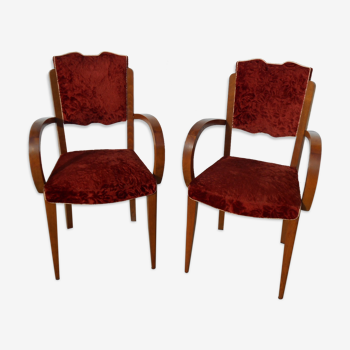 Bridge armchairs in walnut and velvet with brick red reliefs, the 2