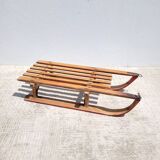 Antique wooden sled with metal runners