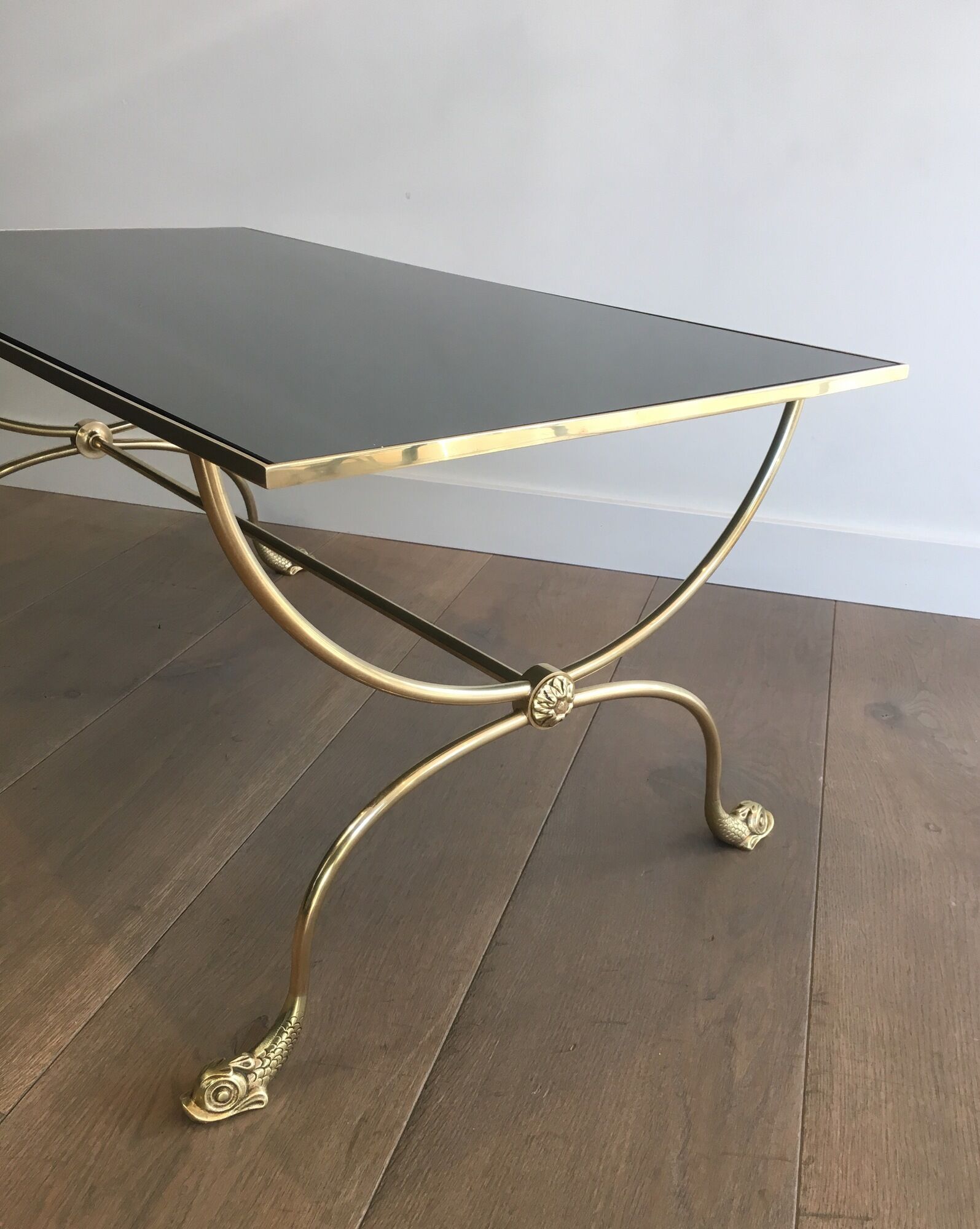 Neoclassical brass style coffee table with dolphin head decoration