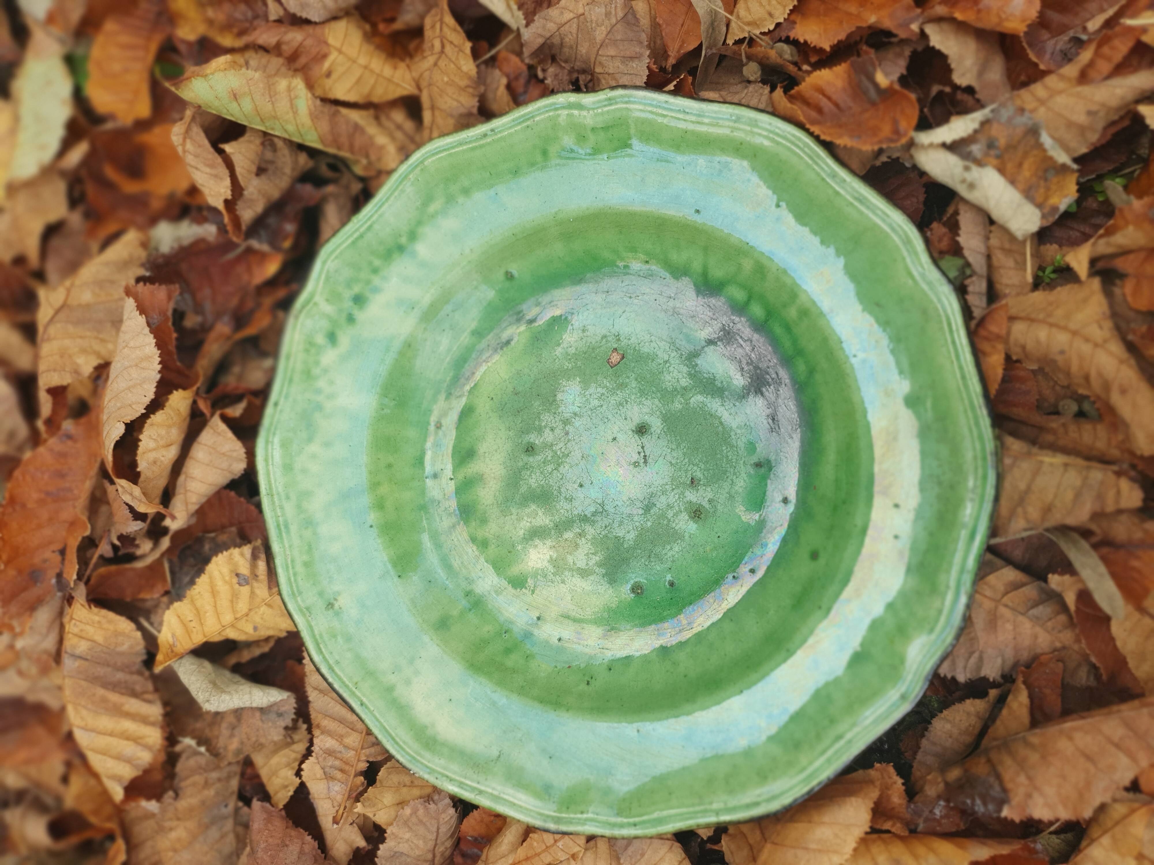 Hollow plate in green glazed clay Etienne Noël
