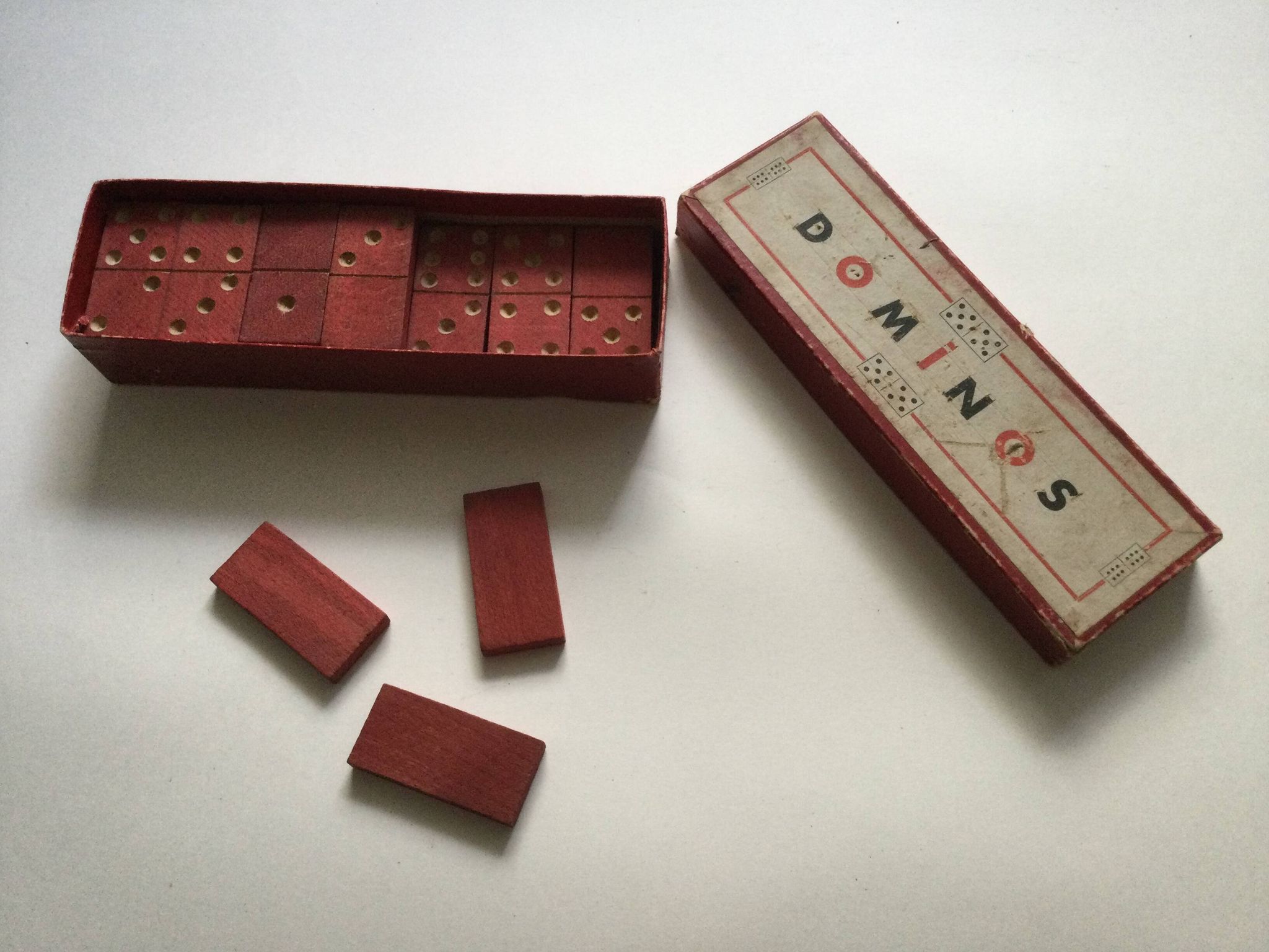 Red wooden dominoes game from the 50s old toy